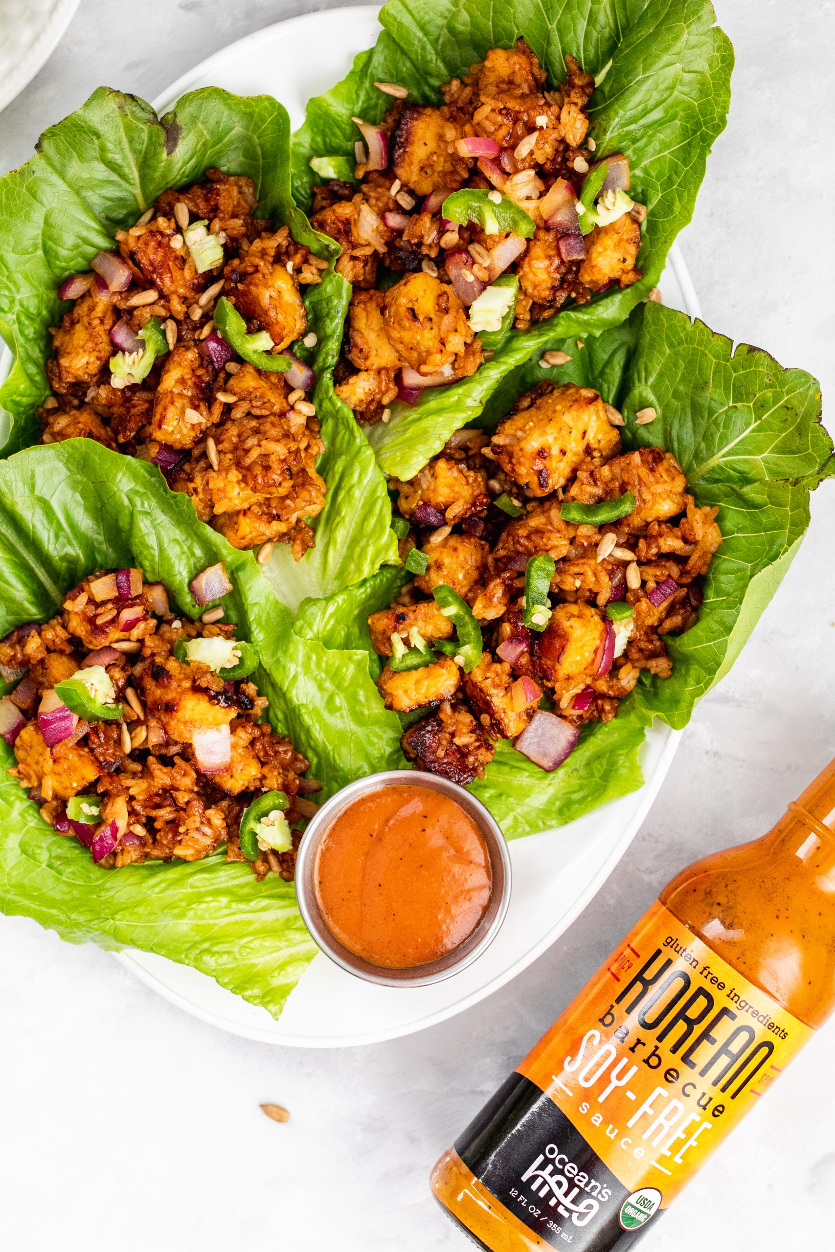 korean bbq tempeh lettuce wraps with rice and onions